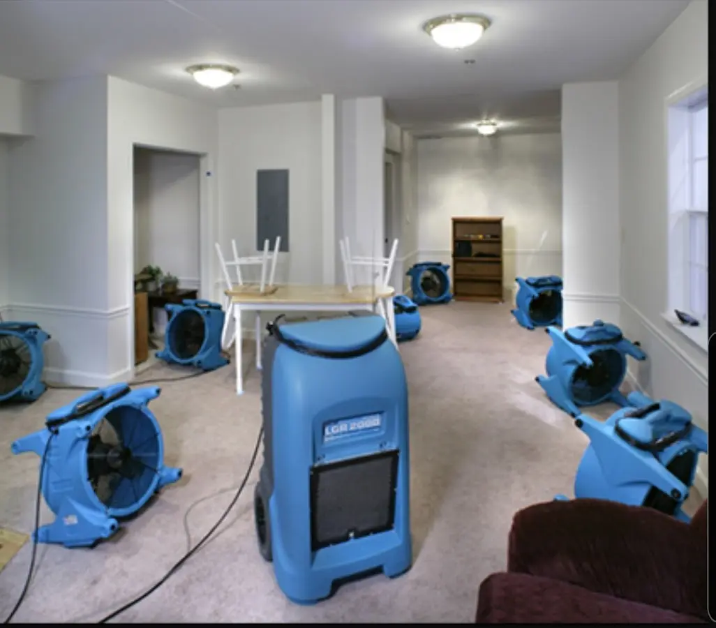 Air movers and dehumidifier setup for Water Damage Restoration in Odenville